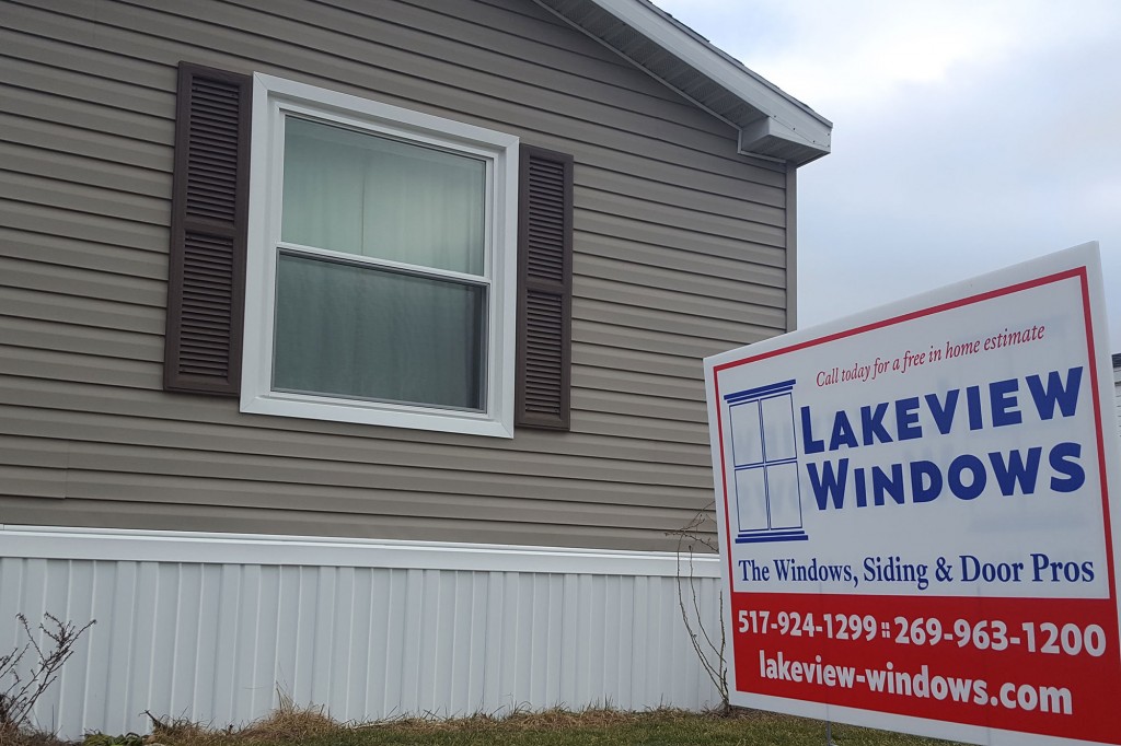 Double-Hung Window and Lakeview Windows & Siding yard sign