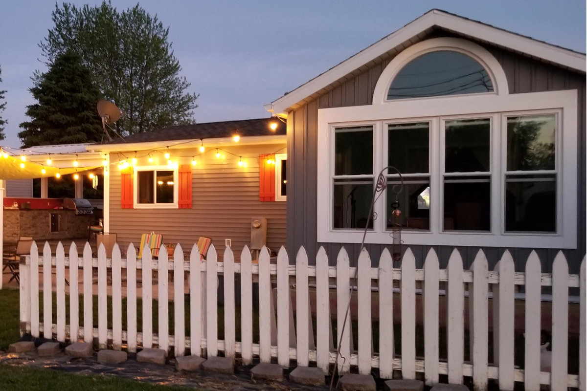 White replacement windows installed in a lakeside home